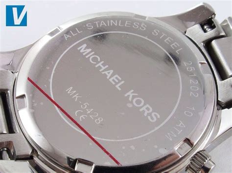 real michael kors watch vs fake|michael kors watch serial number look.